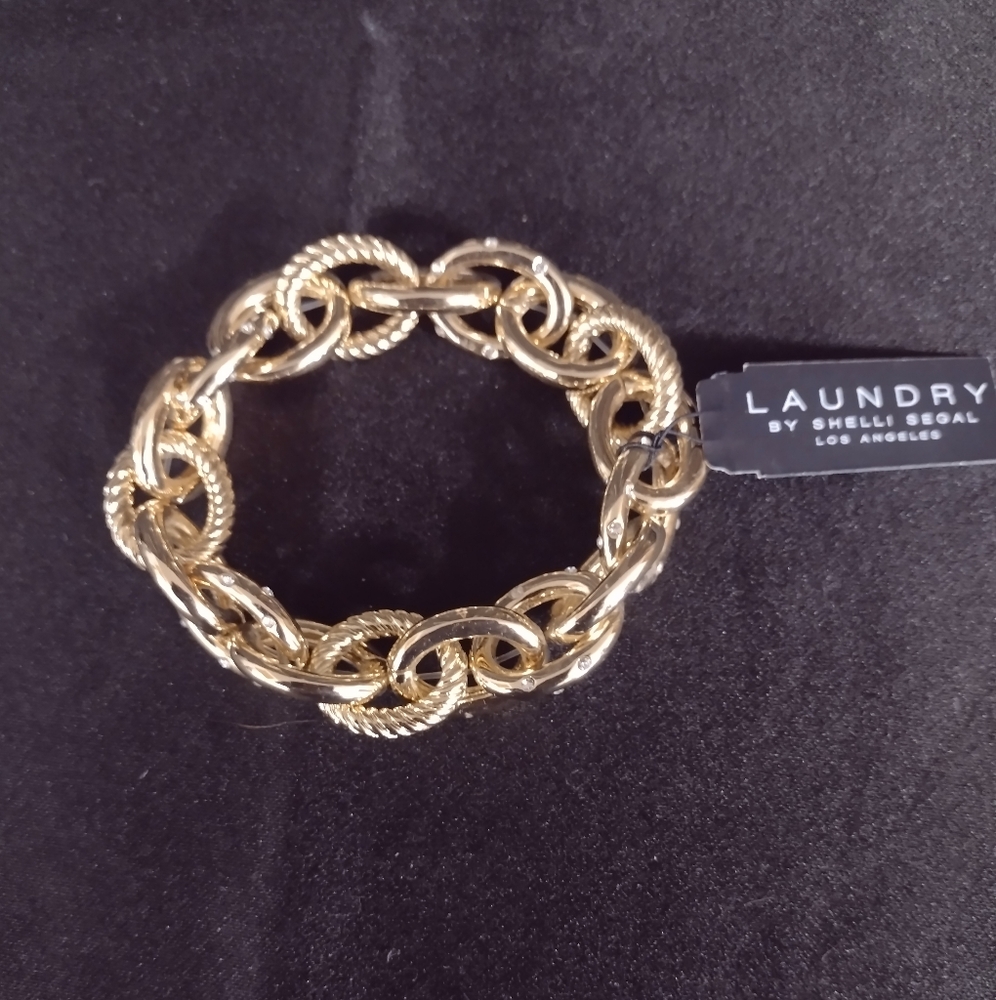 New gold tone bracelet